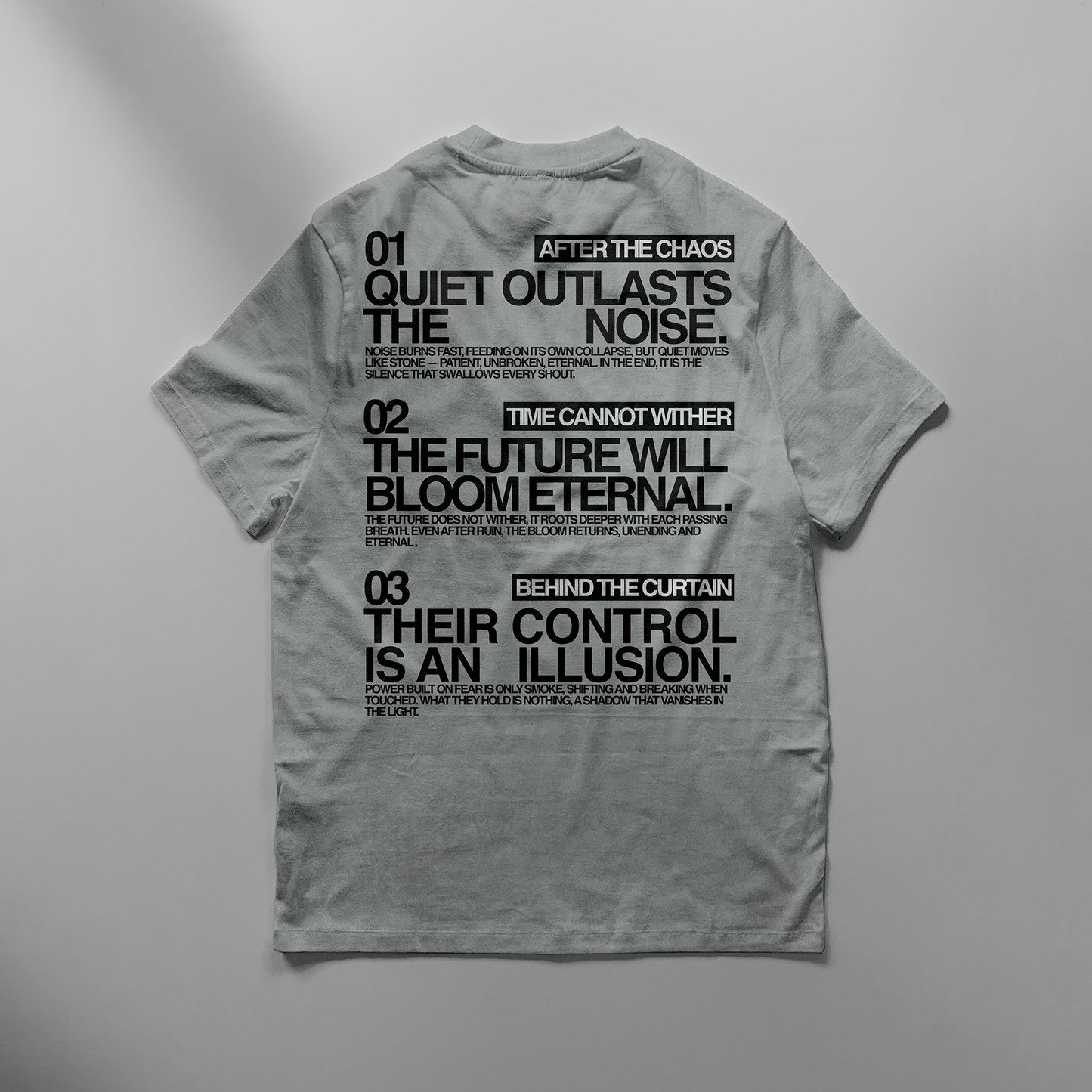 Gray t-shirt with black text on a gray background