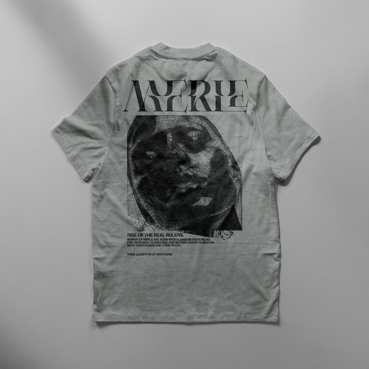 Gray t-shirt with graphic design and text on a gray background