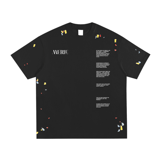 Black t-shirt with colorful small designs and text on a white background
