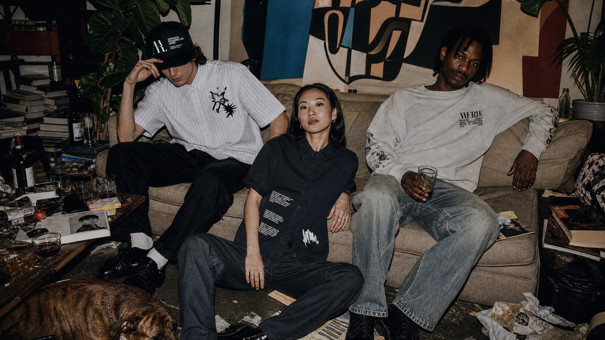 Moody urban editorial image of MERLE clothing moving through a city at night