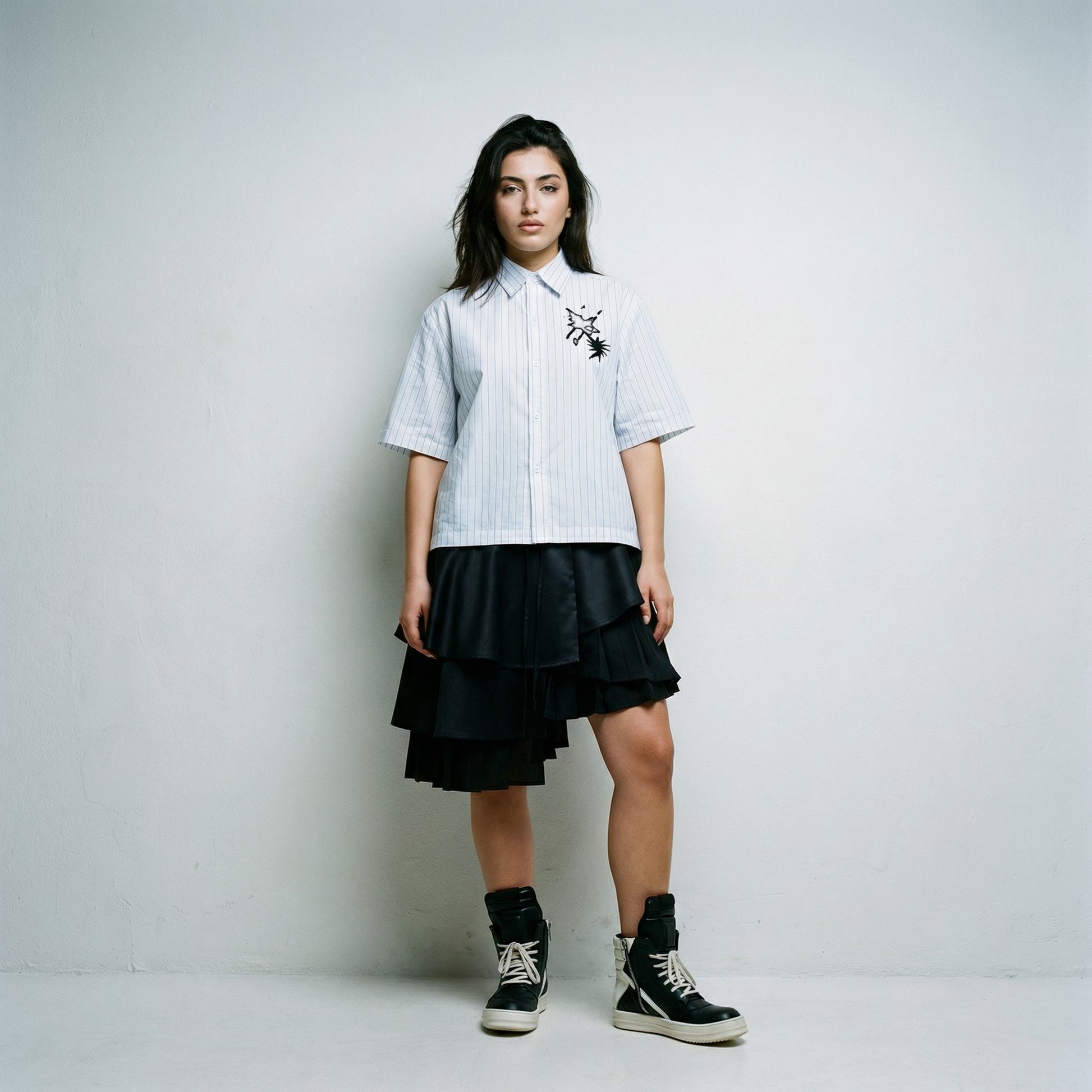 MERLE Distortion Striped Button-Up Shirt styled in a moody urban setting