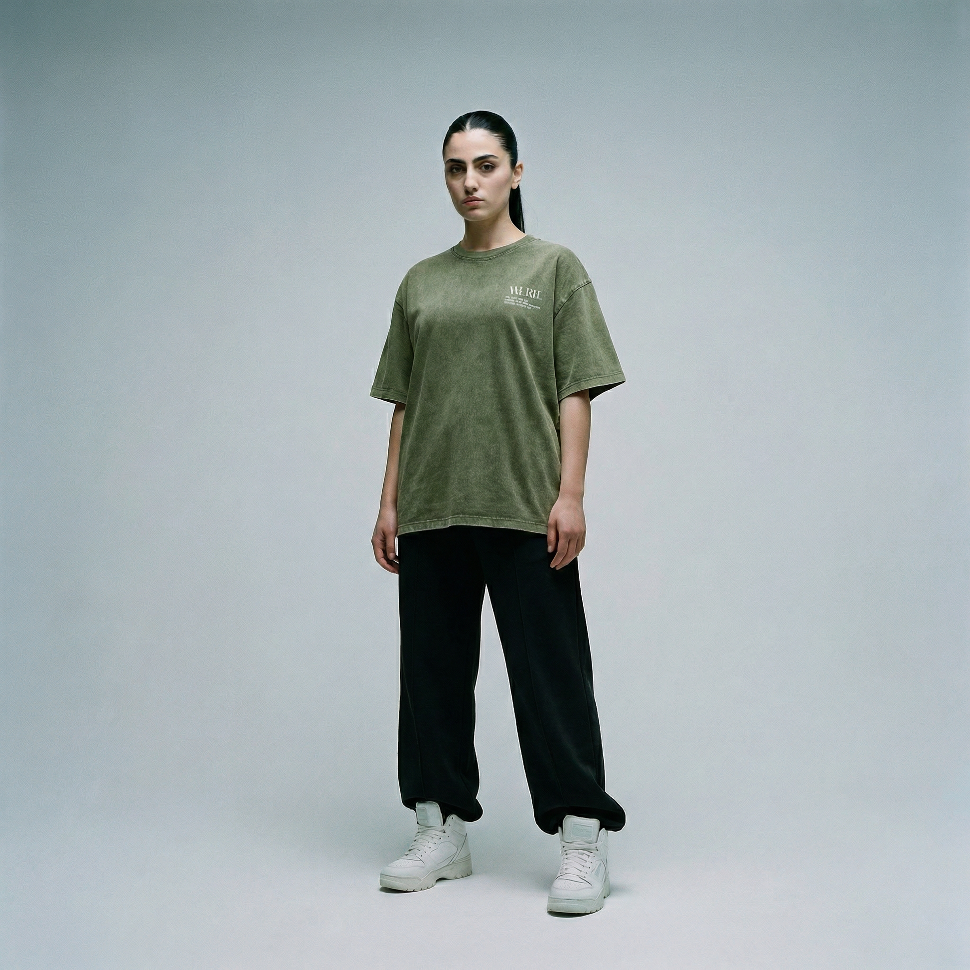 The MERLE Frequency Log T-Shirt in washed olive with distorted archive graphics